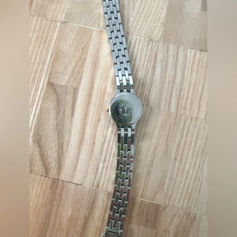 Citizen eco-drive ladies black dial two toned solar dress watch